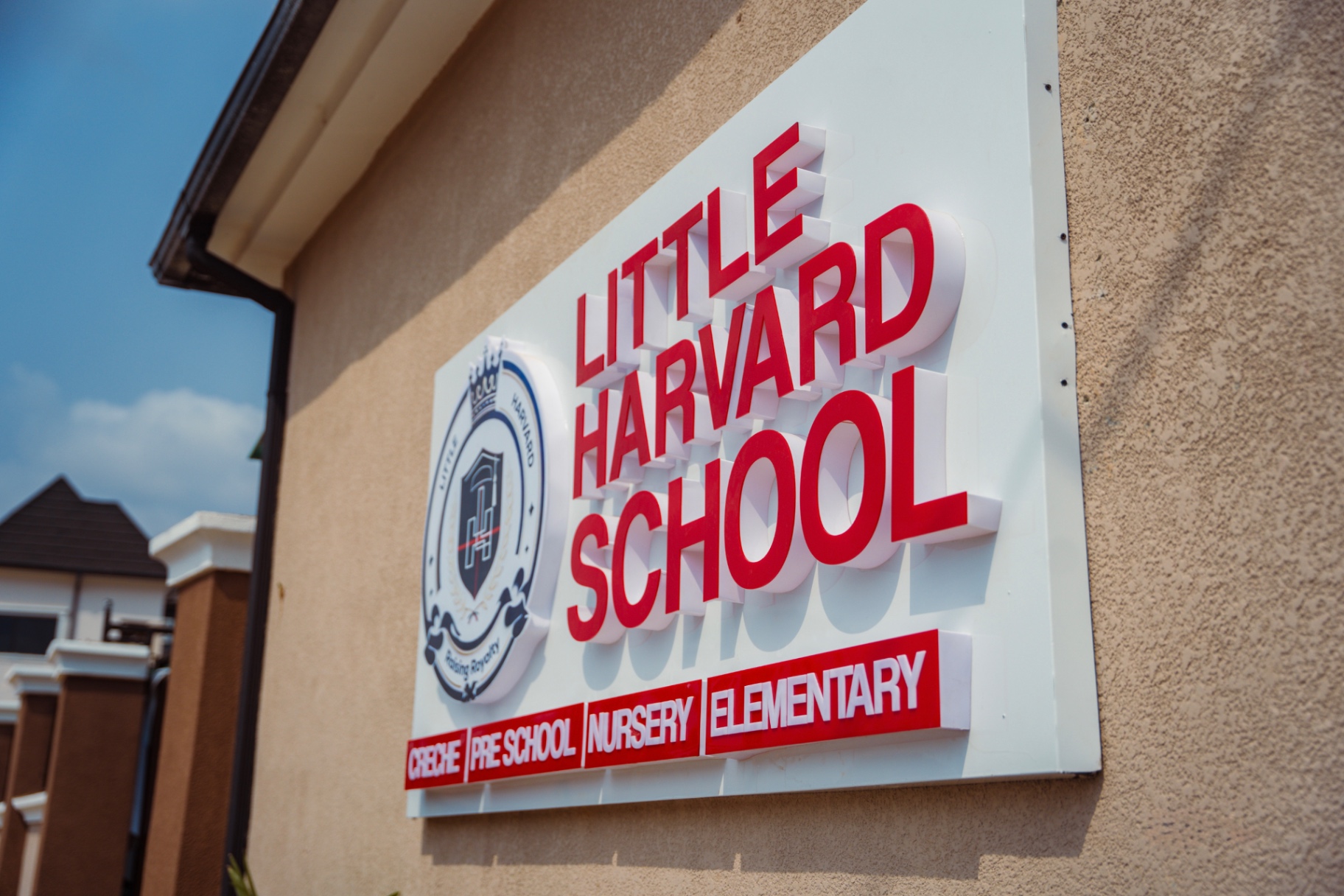 Little Harvard School signage at the campus entrance
