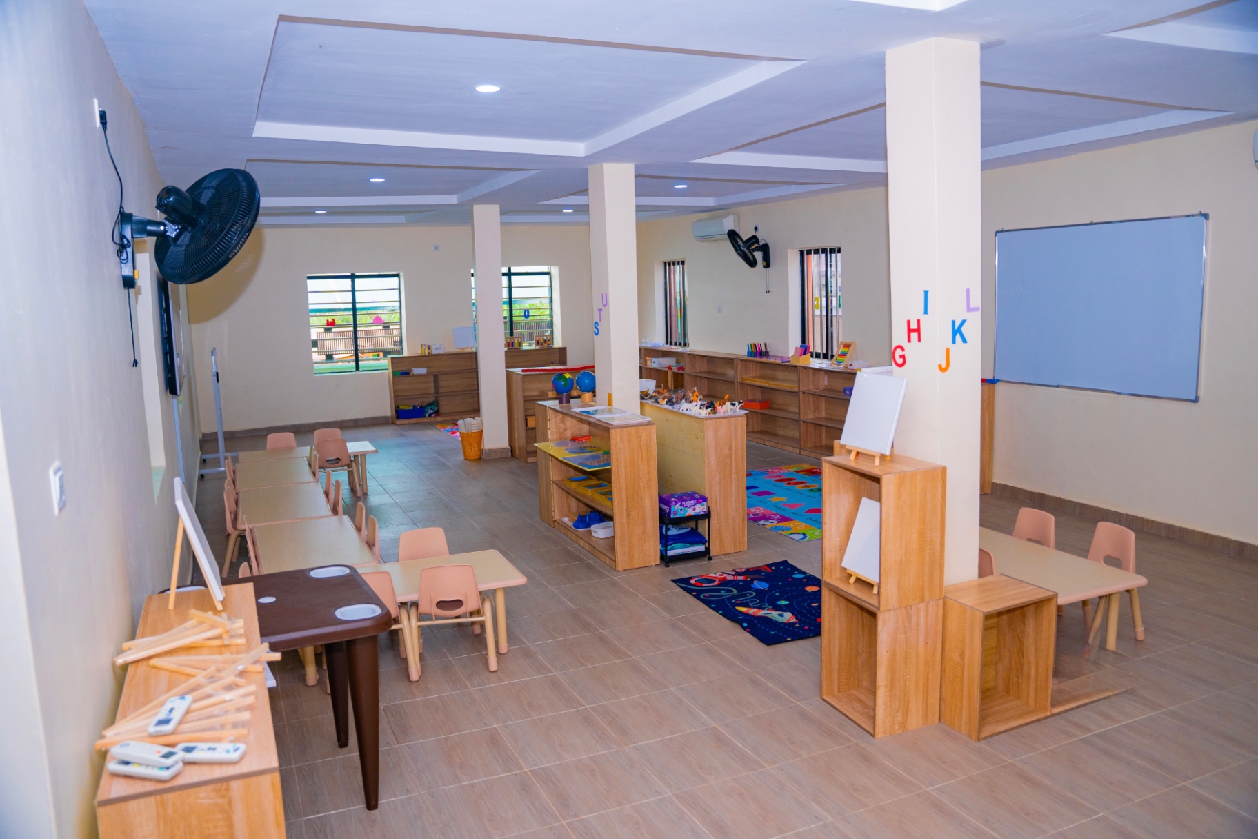 Spacious Montessori classroom with learning stations
